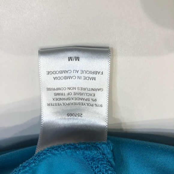 Champions Women’s Turquoise Running Sweater - Picture 6 of 8